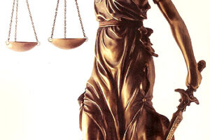 A statue of lady justice holding the scales.